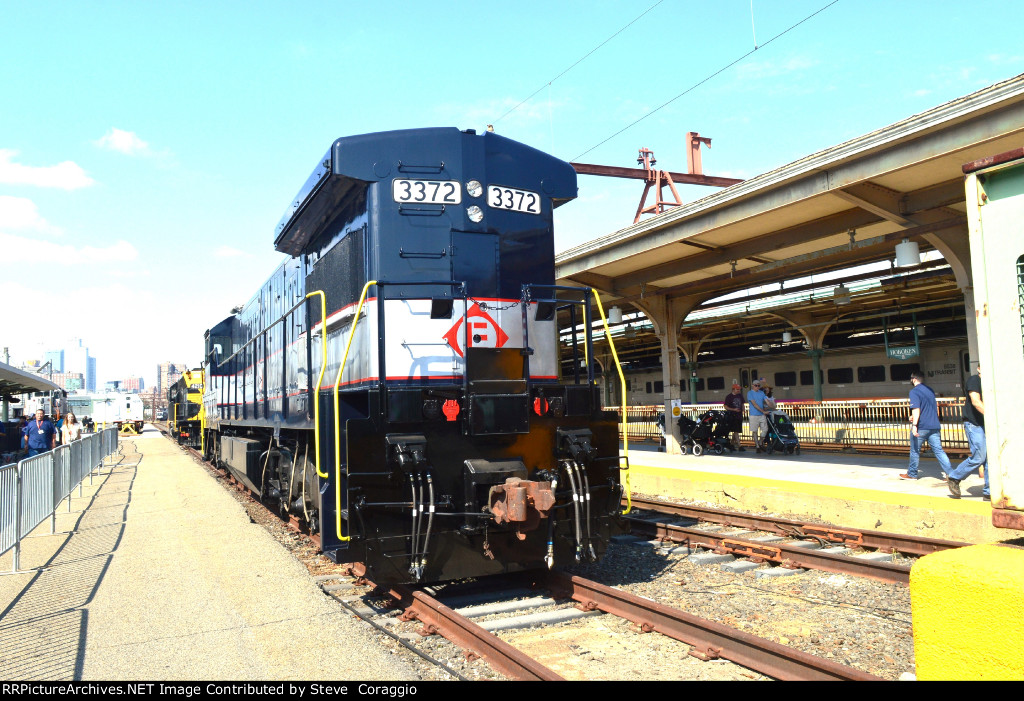 Long hood to cab shot EL 3372 /partial  shot on NJT 4210 Erie HU